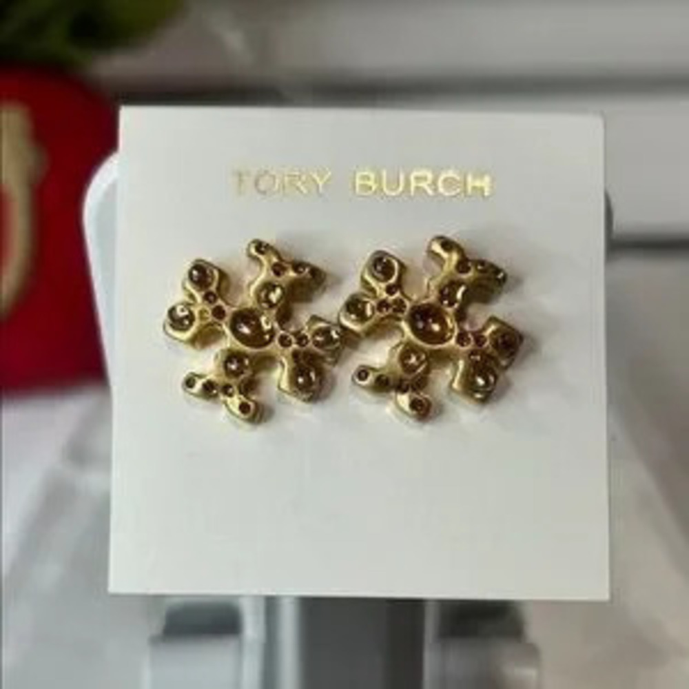 Brand new Tory Burch gold studs
